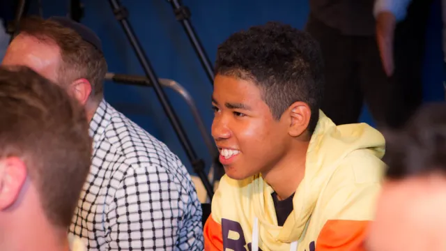 Young man attending BOND event